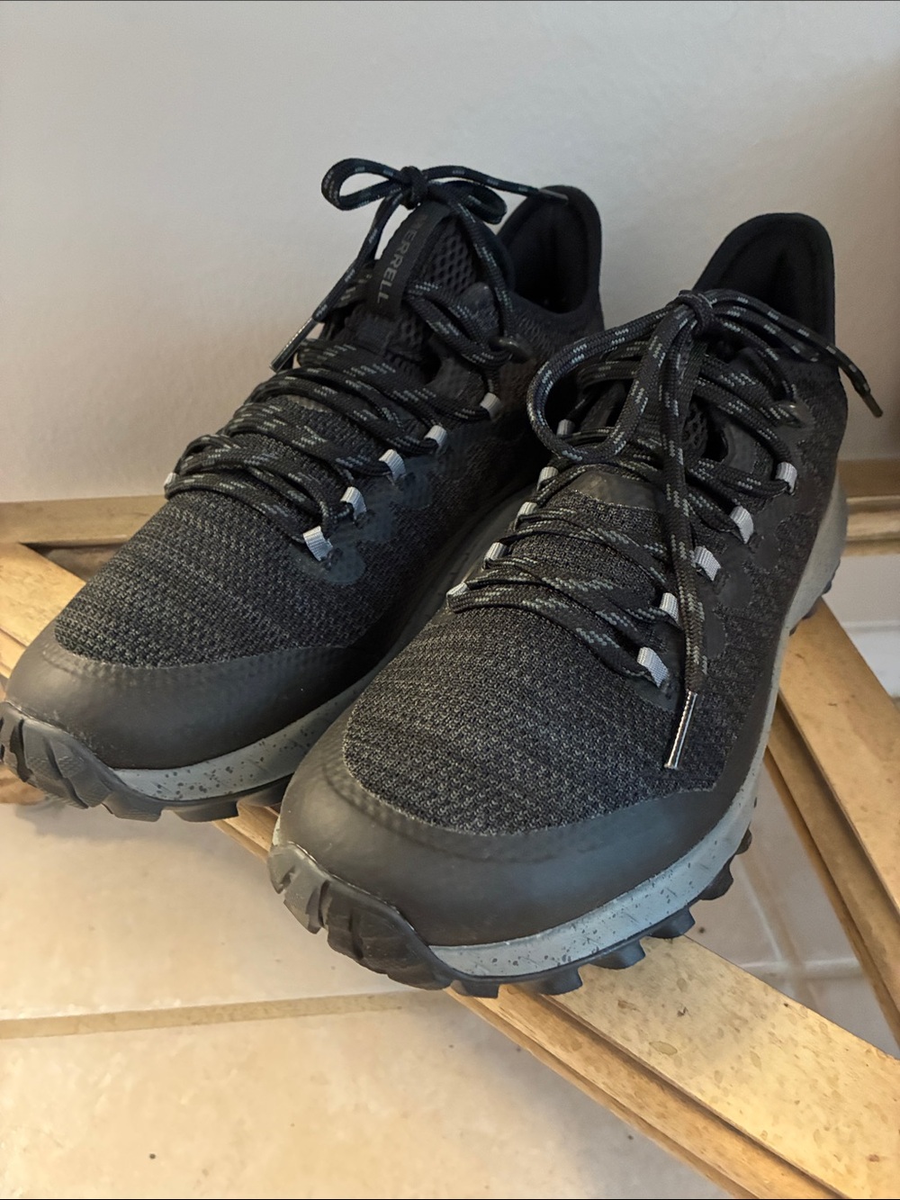 Merrell Women’s Bravada Waterproof Black Hiking Shoes with Subtle Gray Accents.
